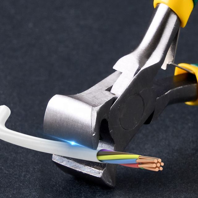 Pliers cutting a multicolored wire against a dark background