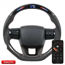 Load image into Gallery viewer, 2015-2020 Toyota Hilux App-Controlled LED LED Display LED Carbon Fibre Steering Wheel