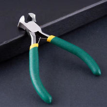 Load image into Gallery viewer, Pair of pliers with green handles on a dark background