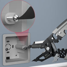 Load image into Gallery viewer, Multi-tool with a close-up of a screw being removed from a wall socket.