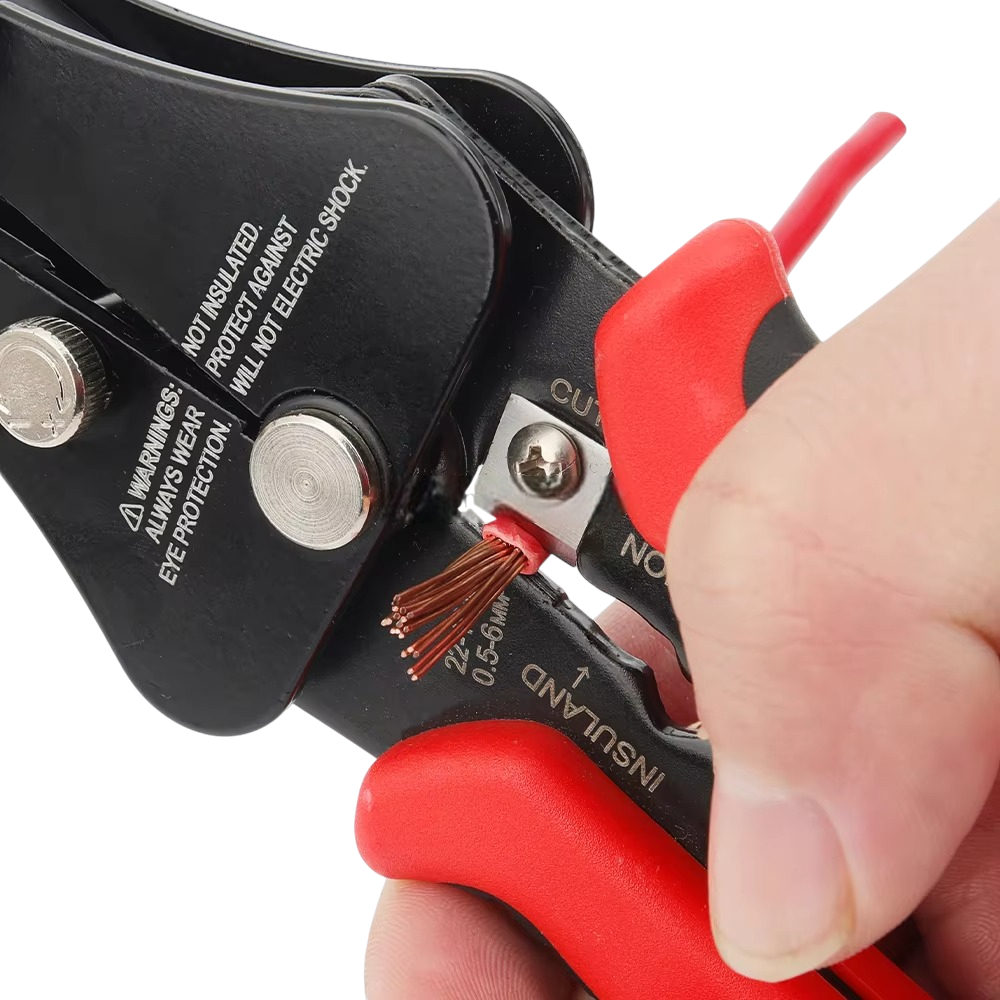Cable stripper being used on a wire with visible branding